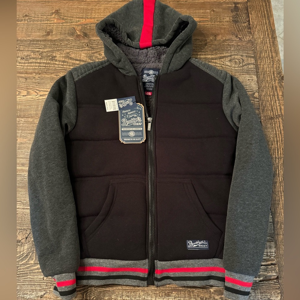 Brand New With Tags boys cozy Sherpa lined zip up hoodie.